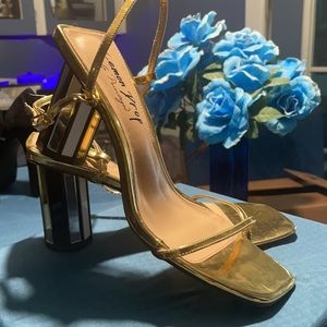 Gold heels .heels are made of mirror. Beautiful